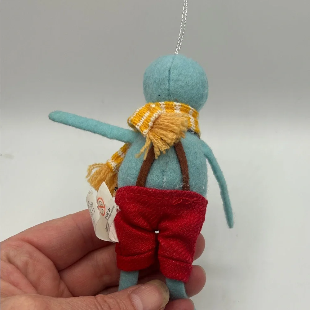 Target Blue Plush Holiday Ornament with Red Pants and Yellow Scarf